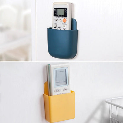 Pack of 2 Wall Mounted Mobile or Remote Holder Stand (Random Colors)